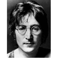 已故前披头士乐队主唱约翰•列侬的一颗牙齿被拍卖